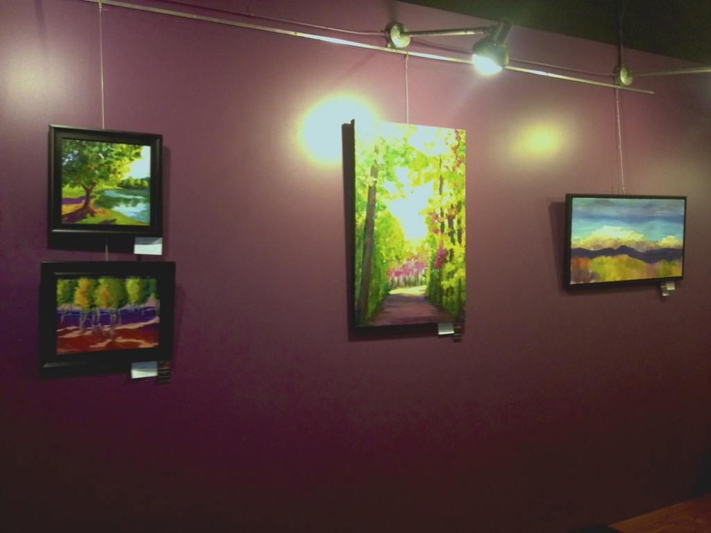 Paintings hanging at Coffee and Crepes Cary, NC
